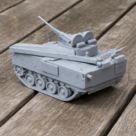 Gray Bionix ARV tank 3D model with detailed tracks and turret, placed on a wooden surface.