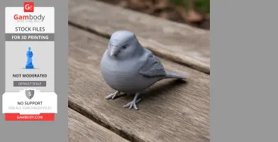A gray 3D-printed bird model, resembling an Ankober serin, placed on wooden planks.