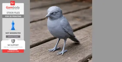A detailed 3D printed model of a small bird with intricate feather textures, placed on a wooden surface.