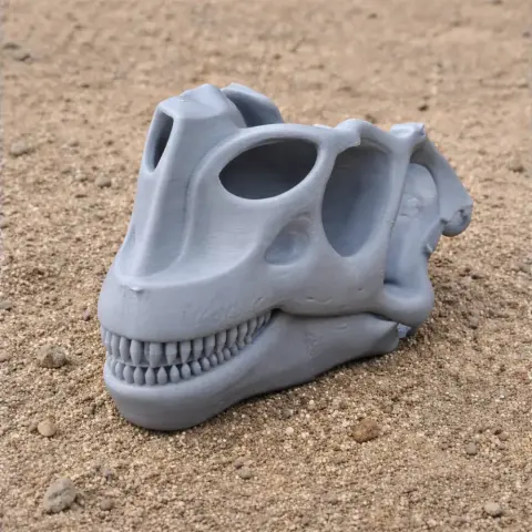 A 3D-printed Arctosaurus skull replica resting on a sandy surface.