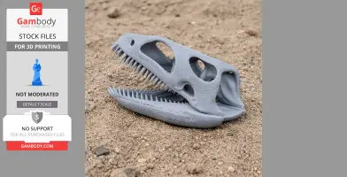 3D-printed Cryptosaurus skull replica with sharp teeth, resting on sandy ground.