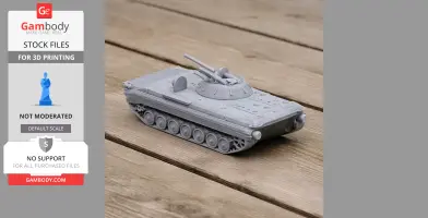 A detailed 3D-printed model of a BMP-1 tank on a wooden surface.