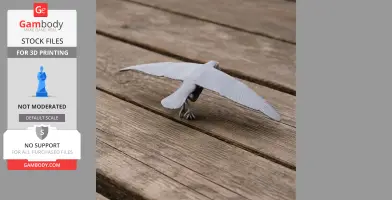 Gray 3D-printed model of an Antarctic prion bird in flight, displayed on wooden planks.