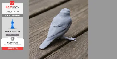 Gray 3D-printed model of a bird, resembling an Arabian golden-winged grosbeak, on wooden surface.