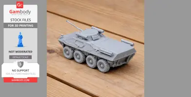 Gray 3D-printed BTR-90 tank model with six wheels, displayed on a wooden surface.