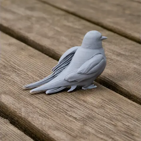 3D printed model of an Arctic Tern bird, detailed feathers, perched on a wooden surface.