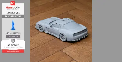 3D printed model of a Callaway C12 car on a wooden floor.