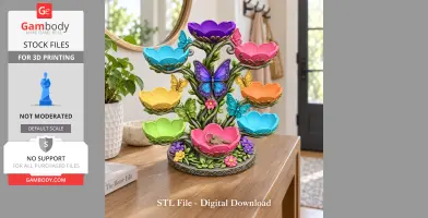Colorful butterfly-themed flower bowl organizer for 3D printing, holding keys on a wooden surface.