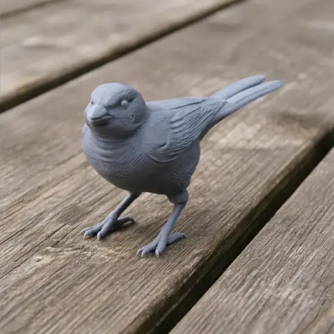 3D printed model of a small bird standing on wooden planks.