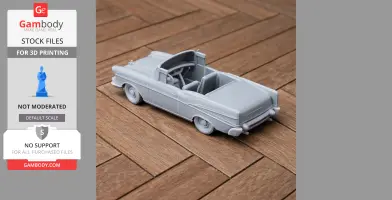 3D-printed model of a 1957 Chevrolet Bel Air convertible on a wooden floor.