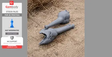 Two gray 3D-printed Mystriosaurus skull replicas lie on sandy ground.