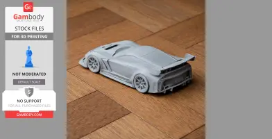 3D printed Chevrolet Corvette C7.R model on a wooden floor.
