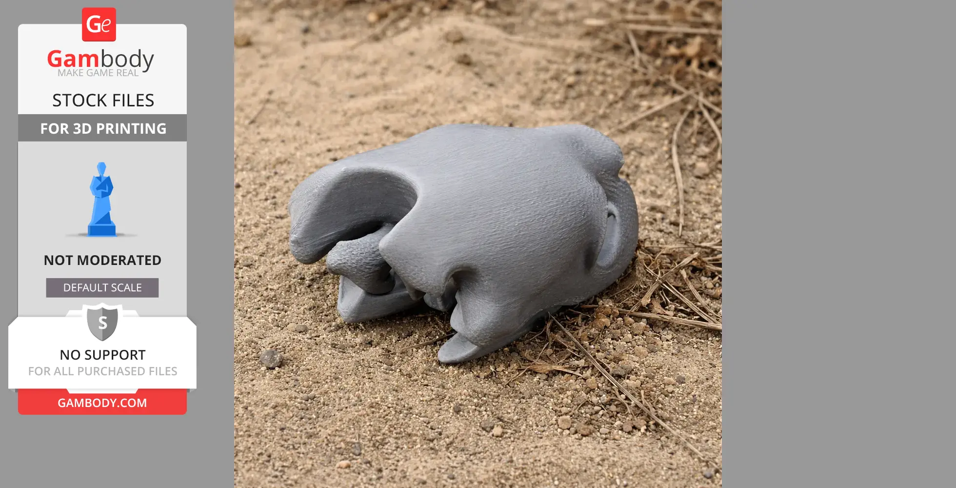 Gray 3D-printed Olive Ridley turtle skull replica resting on sandy ground.