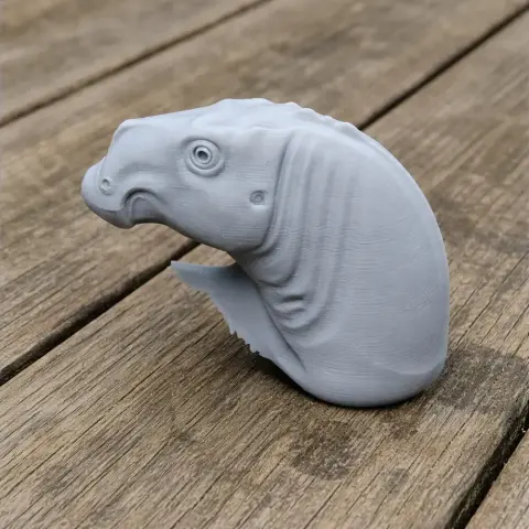 3D printed Acristavus dinosaur model head on a wooden surface.