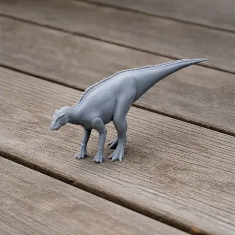 A model of a prehistoric animal, resembling a dinosaur, with a long tail and standing on four legs.
