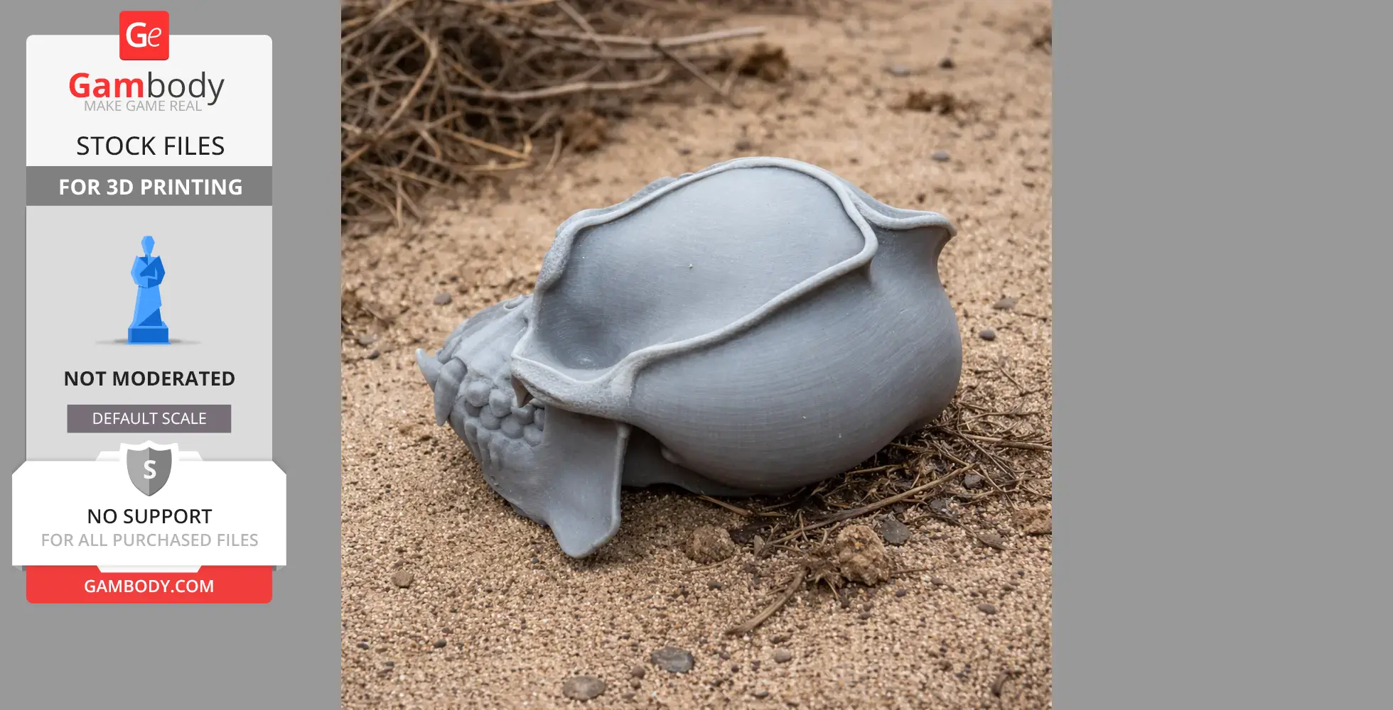 3D printed orangutan skull replica resting on sandy ground.