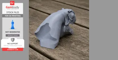 Gray 3D-printed Alashansaurus model on a wooden surface.