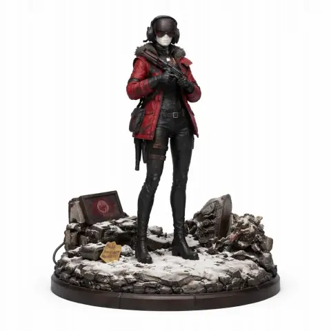 A 3D-printed character in winter attire stands on a snowy base with scattered items around.