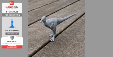 A 3D-printed model of a small, bipedal prehistoric dinosaur with a long tail, standing on a wooden surface.