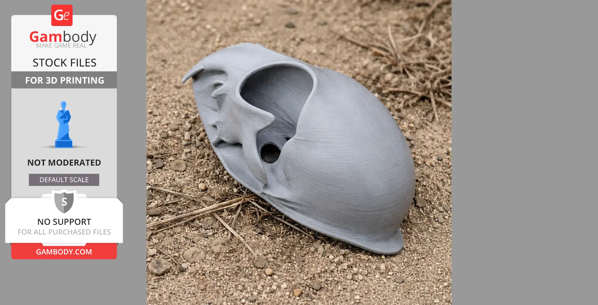 Gray 3D-printed Pallas's cat skull replica on rough ground.