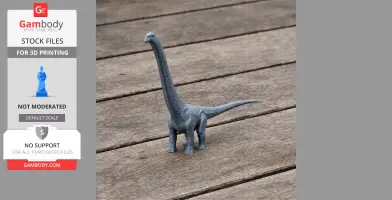 A 3D-printed dinosaur model with a long neck and tail, standing on a wooden surface.