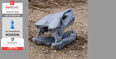 Gray 3D-printed Postosuchus skull replica with open jaws, displayed on a sandy surface.