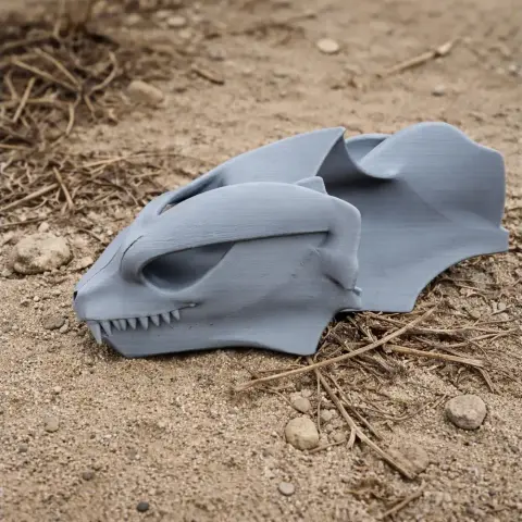 3D printed Probainognathus skull replica resting on a sandy surface.