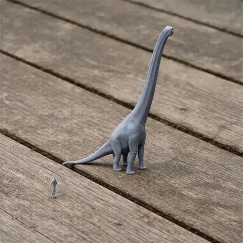 A long-necked prehistoric animal 3D print model beside a small human figure for scale on wood planks.