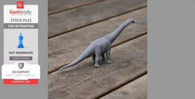 Gray 3D-printed model of an Atlantosaurus dinosaur on a wooden surface.