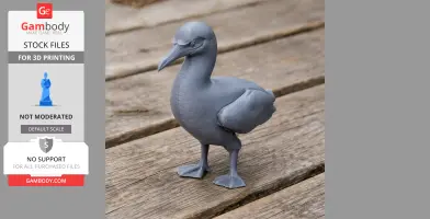 Gray 3D-printed model of an Australasian gannet on a wooden surface.