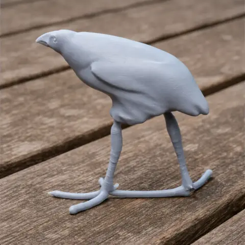 3D printed model of an Australasian swamphen, displayed on a wooden surface.