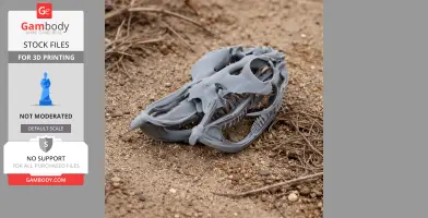 A detailed 3D-printed rhinoceros viper skull replica, displayed on sandy ground.