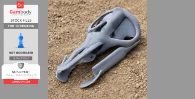 3D printed Rhinorex skull replica resting on gravel surface.