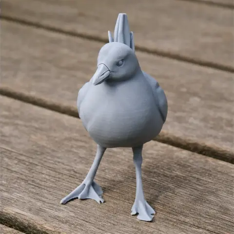 3D-printed model of an Australian crake, posed on a wooden surface.