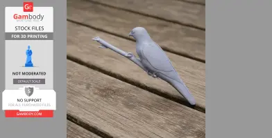 3D printed model of a bird perched on a branch, displayed on wooden surface.