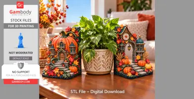 Autumn-themed pumpkin house bookends adorned with leaves, surrounding a potted plant.