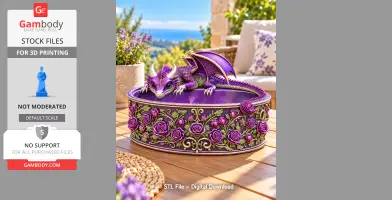 A purple dragon figure atop a decorative bowl with intricate rose designs, set on a sunny patio.