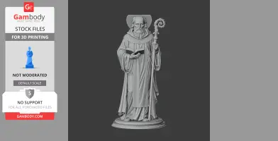 A devotional statue of a saint holding a staff and book, wearing robes, with a halo around the head.