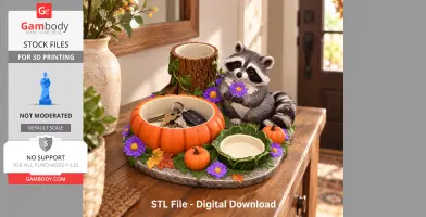 A raccoon-themed organizer with pumpkin-shaped bowls for holding keys and small items.