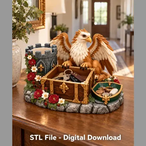 A griffin perched on a treasure chest key organizer with floral decorations and castle turret details.