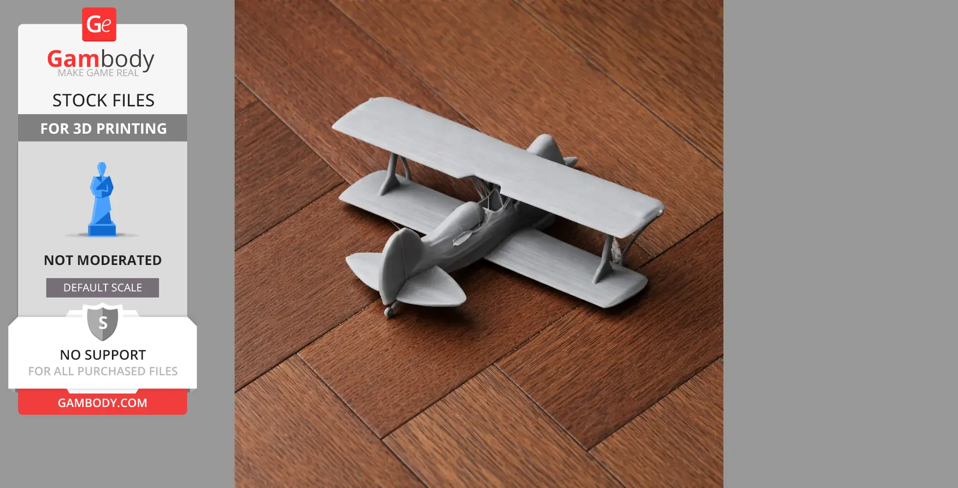Gray 3D-printed Acro Sport II biplane model on wooden floor.