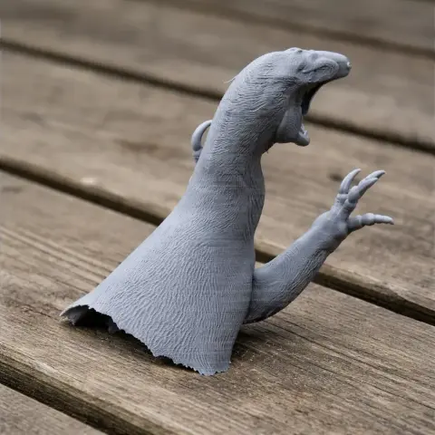 Gray 3D printed Australovenator bust with detailed claws and open mouth on a wooden surface.