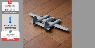 Gray 3D-printed model airplane with twin tail fins on wooden surface.