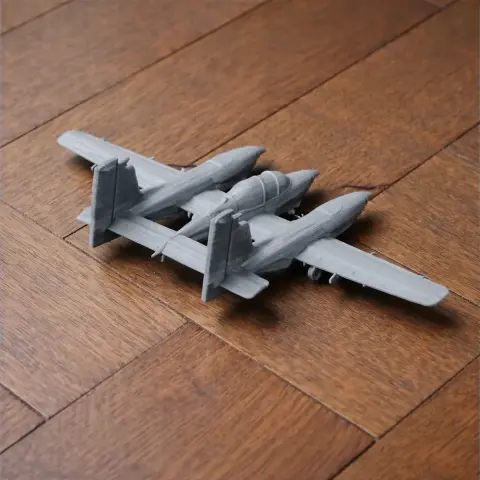 3D printed model of the AESL Airtourer aircraft on a wooden surface.