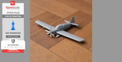 A 3D-printed model of a small aircraft with a propeller, displayed on a wooden surface.