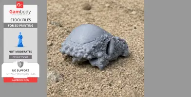 Gray 3D-printed Sanpasaurus skull on sandy surface.