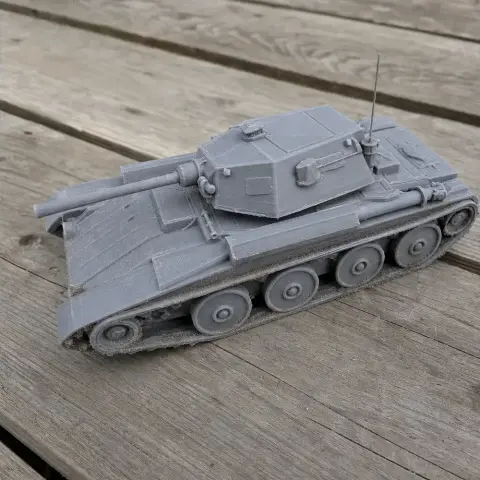3D-printed model of a Covenanter tank on a wooden surface.
