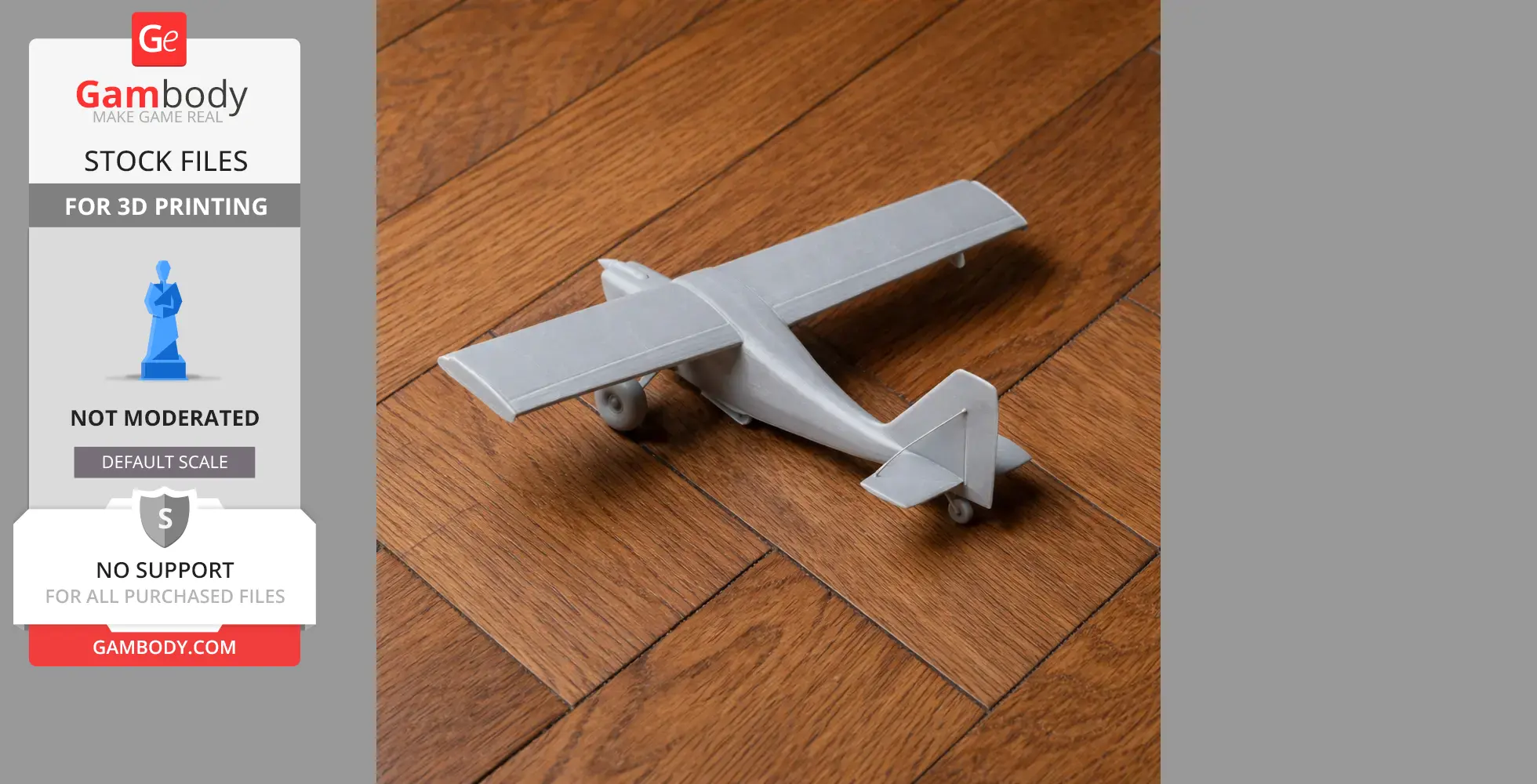 3D-printed model of an airplane on a wooden floor, showcasing its wings and tail design.