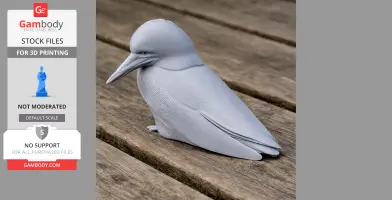 Gray 3D-printed model of a kingfisher bird, resting on a wooden surface.