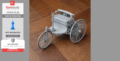 A detailed 3D printed model of the Benz Patent-Motorwagen on a wooden surface.